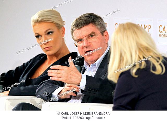 Alpine downhill skier Maria Hoefl-Riesch (L-R), the vice president of the International Olympic Committee (IOC), Thomas Bach
