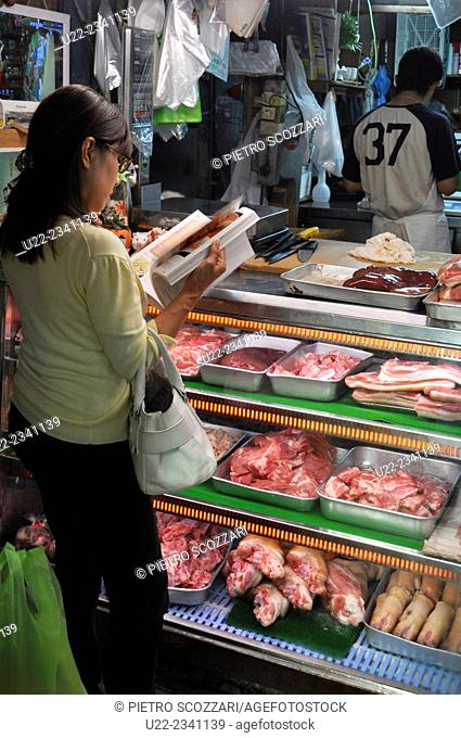 Naha, Okinawa, Japan: butchery at Sakaemachi Market