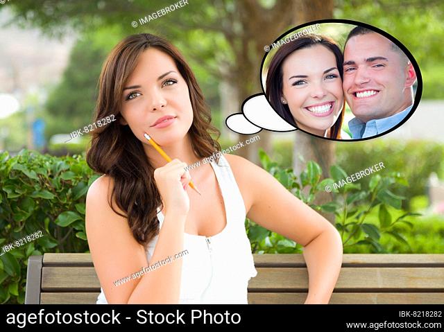 Thoughtful young woman with herself and handsome young man inside thought bubble