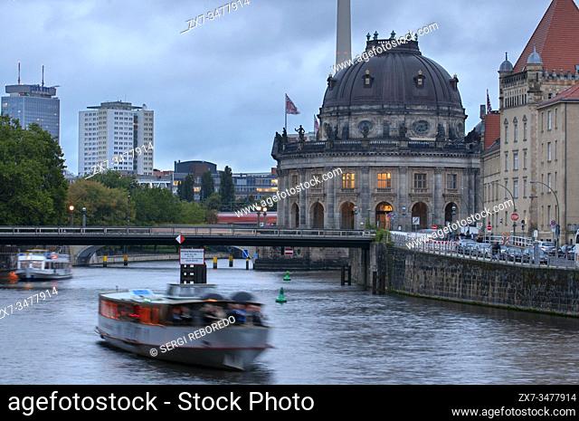 Beautiful view of historic Bode Museum Berlin Museumsinsel and Spree river in twilight during blue hour at dusk, Berlin Germany