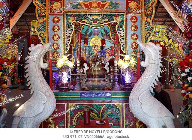 Mieu Ba Ngu Hanh buddhist temple. Main altar with Red Crowned Cranes a symbolism of longevity and good luck. Vung Tau. Vietnam