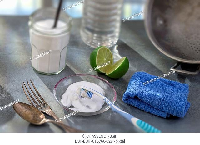 Baking soda, lemon with sponge and towel for effective and safe house cleaning