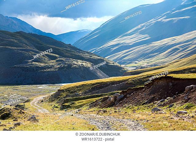 Majestic dirt road in Kirgizia