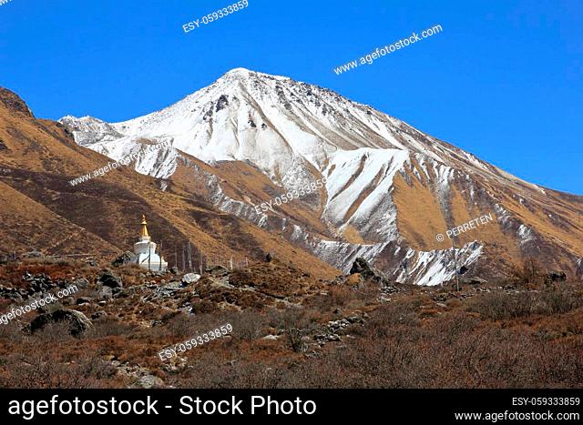 Mount Tserko Ri and small stupa. Spring scene in the Langtang valley