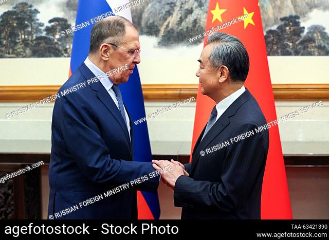 CHINA, BEIJING - OCTOBER 16, 2023: Russia's Minister of Foreign Affairs Sergei Lavrov and China's Minister of Foreign Affairs Wang Yi shake hands during a...