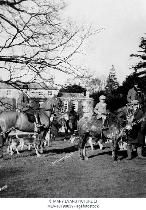 Landed gentry at the fox meet of the Berkeley hounds, Eastington, Gloucestershire, England, including a little boy on his horse