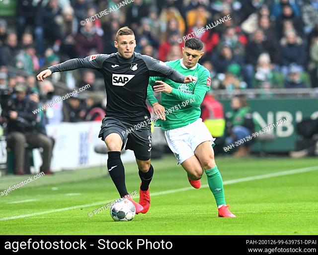 26 January 2020, Bremen: Football: Bundesliga, Werder Bremen - TSG 1899 Hoffenheim , 19th matchday. Bremen's Milot Rashica (r) fights Hoffenheim's Pavel...