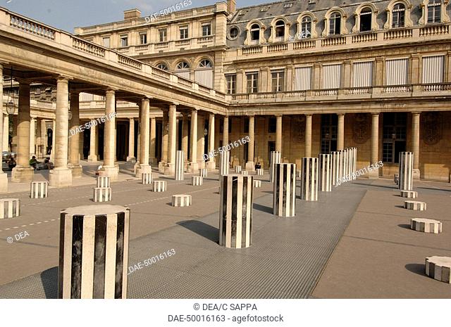 France - Ile-de-France - Paris. Palais Royal. UNESCO World Heritage List, 1991. Main courtyard 'Cour d'Honneur'. Daniel Buren, 1986, Les Deux Plateaux
