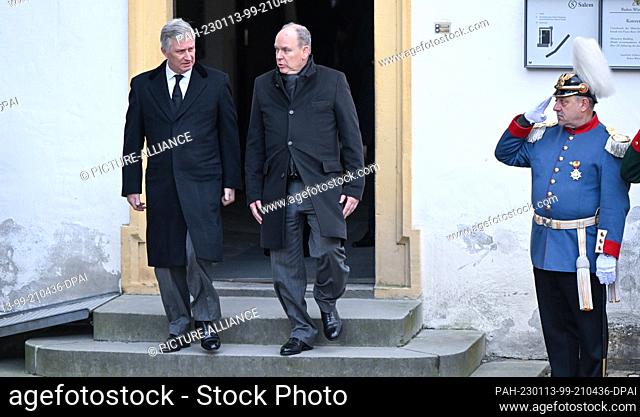 13 January 2023, Baden-Wuerttemberg, Salem: King Philippe of Belgium and Prince Albert II of Monaco (r) leave the Minster after the funeral service of Max...