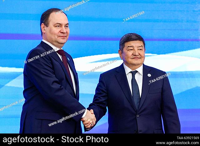 KYRGYZSTAN, BISHKEK - OCTOBER 26, 2023: Belarusian Prime Minister Roman Golovchenko (L) and Kyrgyzstan's Cabinet of Ministers Chairman/ Head of the Presidential...