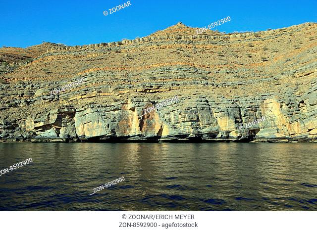 Colourful cliffs in the fjord Khor Ash Sham inOman