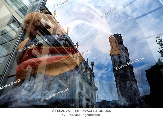 Church of Sant Pere Reflected in a Shop window of Dalí's Theatre Museum, that houses a sculpture, Figueres.Girona province. Catalonia. Spain
