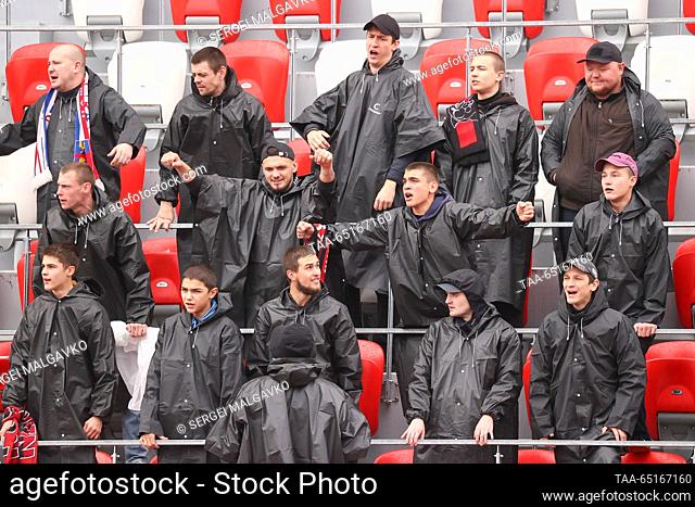 RUSSIA, REPUBLIC OF CRIMEA - NOVEMBER 25, 2023: Fans wear black raincoats during the 2023 Russian Second League Division B Group 1A Round 6 football match...