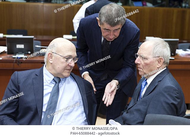 Brussels, Belgium, January 15, 2016. -- French Finance & Public Accounts Minister Michel Sapin (L) is talking with the Czech Republic's Finance Minister Andrej...