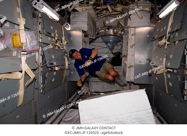 European Space Agency astronaut Christer Fuglesang, STS-128 mission specialist, is pictured floating freely in the Leonardo Multi-Purpose Logistics Module...