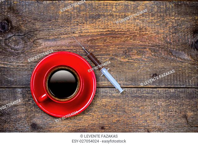 Your daily shot of coffee with red cup and syringe