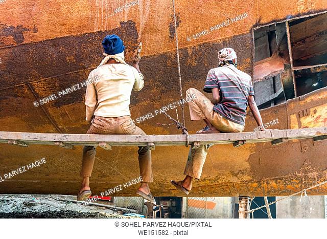 DHAKA, BANGLADESH - December 13: Local workers are working to repair ships in dockyard on December, 13, 2016 in Dhaka, Bangladesh