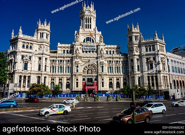Madrid, Spain - June 17 : The Madrid city hall on June 17, 2017. A welcome refugees banner is displayed on the city hall