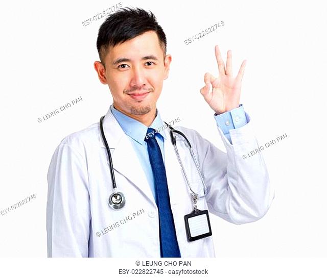 Asian male doctor with ok sign