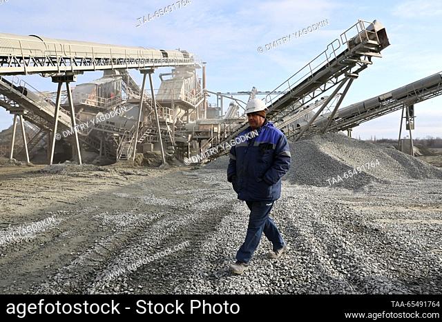 RUSSIA, DONETSK PEOPLE'S REPUBLIC - DECEMBER 5, 2023: A worker is seen at an aggregate processing plant at Kalchiksky granite quarry run by the Nedra state...