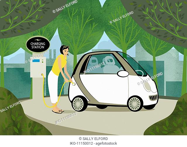 Woman recharging her electric car among trees