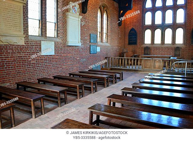 The historic colonistsâ. . church in Jamestown Virginia shows the minimal pews and brick walls