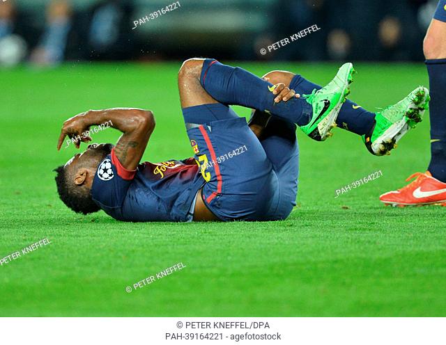 Barcelona's Alex Song lies on the pitch during the UEFA Champions League semi final second leg soccer match between FC Barcelona and FC Bayern Munich at Camp...