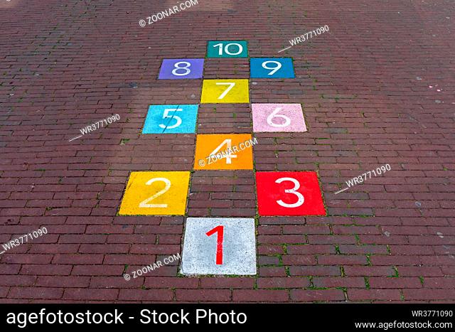 Colourful Hopscotch Playground Markings Numbers at Pavement