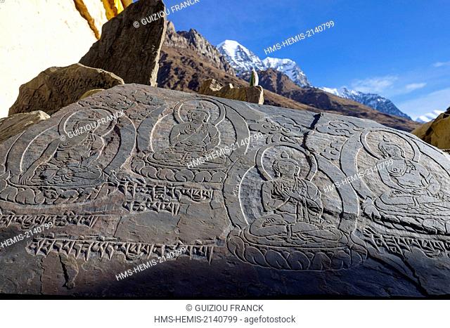 Nepal, Gandaki zone, Manaslu Circuit, between Lho and Samagaon, Samagaon (alt.3520m), stones engraved with Buddhist sacred formulas or mani stones
