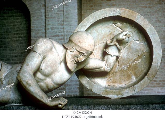 Detail of fallen warrior from the East Pediment of Temple of Aphaia, Aegina, Greece, c500-c480 BC. This item is now in the Munich Glyptothek: Germany