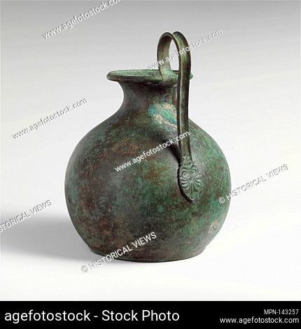Bronze oinochoe (jug). Period: Archaic; Date: late 6th century B.C; Culture: East Greek; Medium: Bronze; Dimensions: H. x width 9 1/16 x 5 in