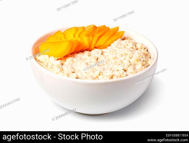 prepared oatmeal with fruits isolated on white background