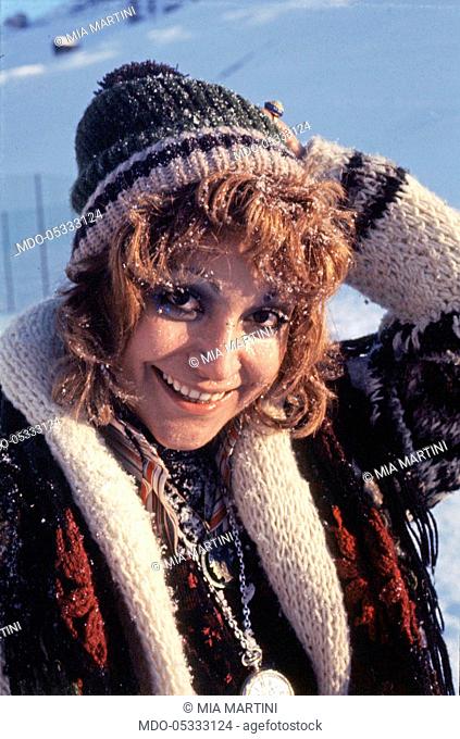 The singer Mia Martini (Domenica Rita Adriana Bertè) smiling in the snow. Livigno, Italy. 1973
