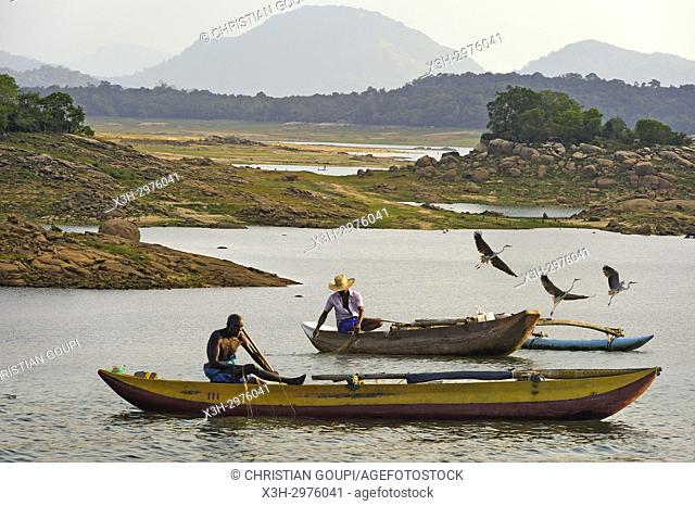 fishermen with a pirogue on the Senanayake Samudraya Lake, Gal Oya National Park, Sri Lanka, Indian subcontinent, South Asia