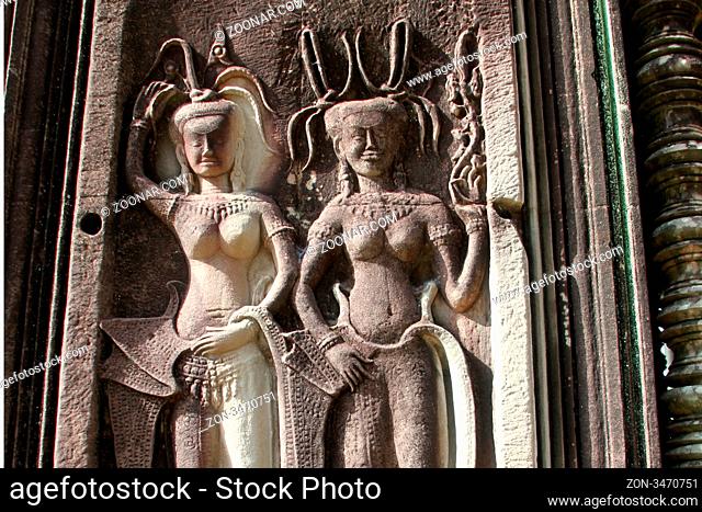Two apsaeas on the wall of Angkor wat, Cambodia