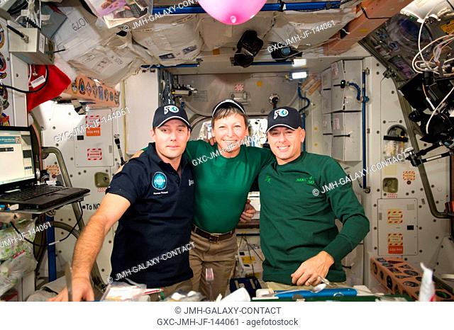 The crew of Expedition 50 gathered together to celebrate the holidays aboard the International Space Station. From left to right: ESA astronaut Thomas Pesquest...