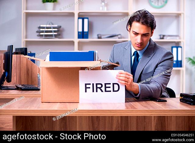 The young male employee being fired from his work