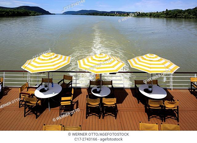 tourism, holiday, freetime, Danube river cruise, Danube navigation, open afterdeck on an aROSA cruiser, restaurant, dishes, chairs, sunshades