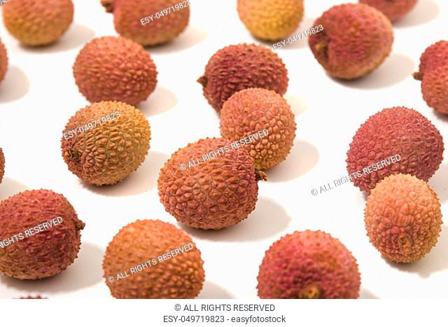 Bunch of Lychee fruits isolated on a white background