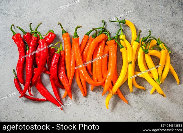 Colorful vibrant peppers, hot scale