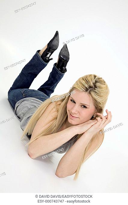Young woman posing on white background with some attitude