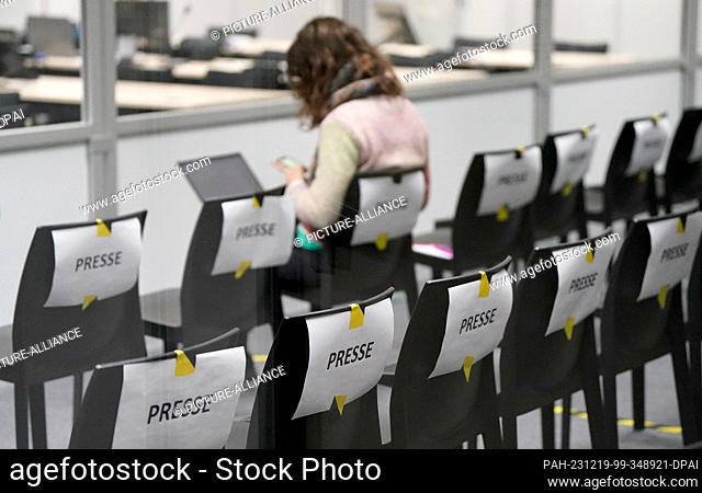 19 December 2023, Schleswig-Holstein, Itzehoe: Chairs marked ""Press"" are available for media representatives in the audience area in the courtroom at the...