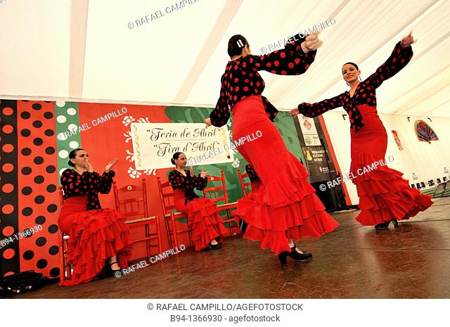 Women dancing flamenco, April Fair, Barcelona. Catalonia, Spain