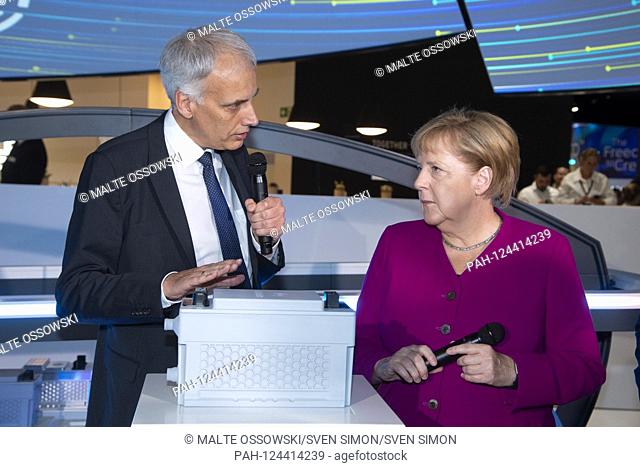 from left: Rolf BREIDENBACH, CEO of Hella, Chancellor Angela MERKEL, on a battery, opening International Motor Show IAA 2019 in Frankfurt, on 12.09