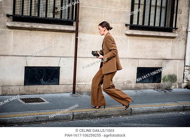 Jo Ellison, Fashion Editor for the Financial Times, arriving on the street before the Armani runway show during Haute Couture Fashion Week in Paris - July 3