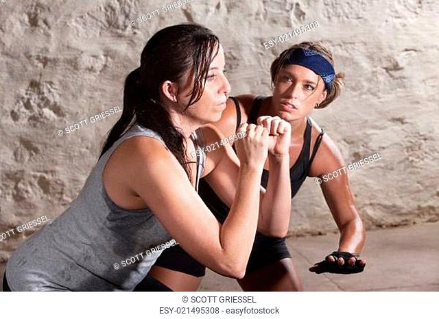 Trainer Watching Athlete During Boot Camp Training