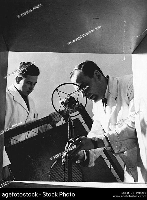 He Sells Silence -- Douglas Smart and an assistant test a ventilator duct in their laboratory. Restoring quiet in a noisy world is the unusual occupation of Mr
