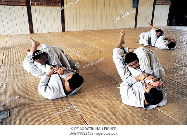 Men in the gym doing judo exercises, Japan