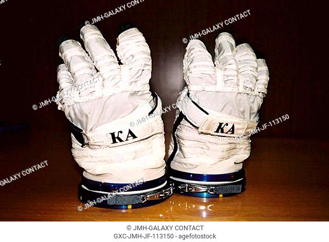 Close-up view of astronaut Clayton C. Anderson's Sokol suit gloves with his initials in Cyrillic, photographed in the Zvezda Facility near Moscow, Russia