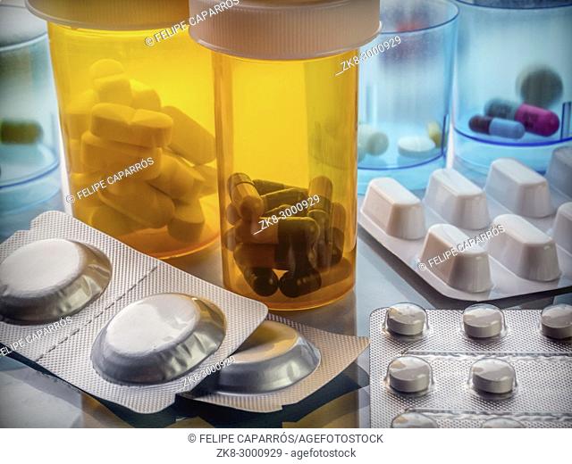 Amber transparent pill bottles, conceptual image